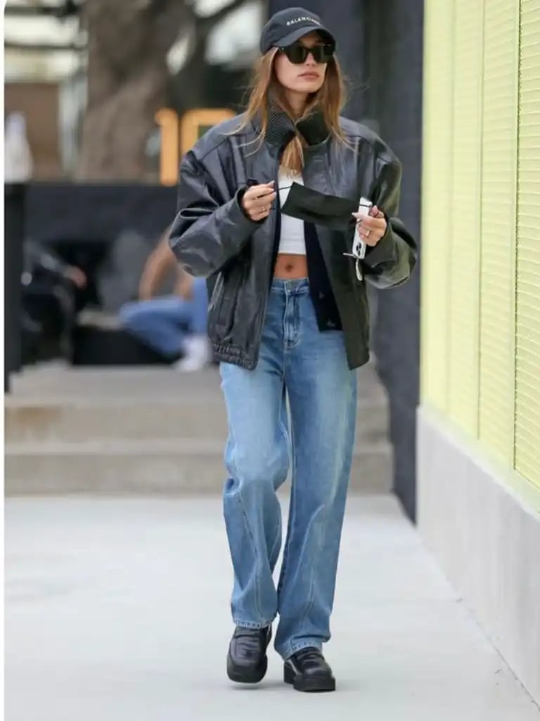 Oversized Black Leather Jacket with V-Neck Top and Jeans — Classy Varsity Jacket Outfits