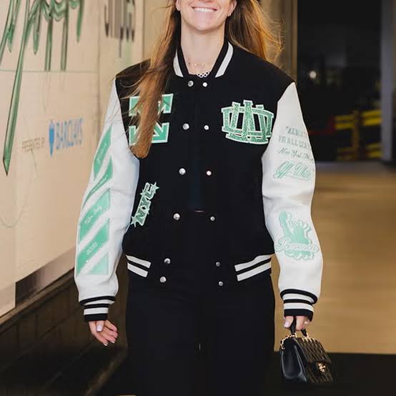 NY Liberty Varsity Jacket with Dark Trousers — Classy Varsity Jacket Outfits