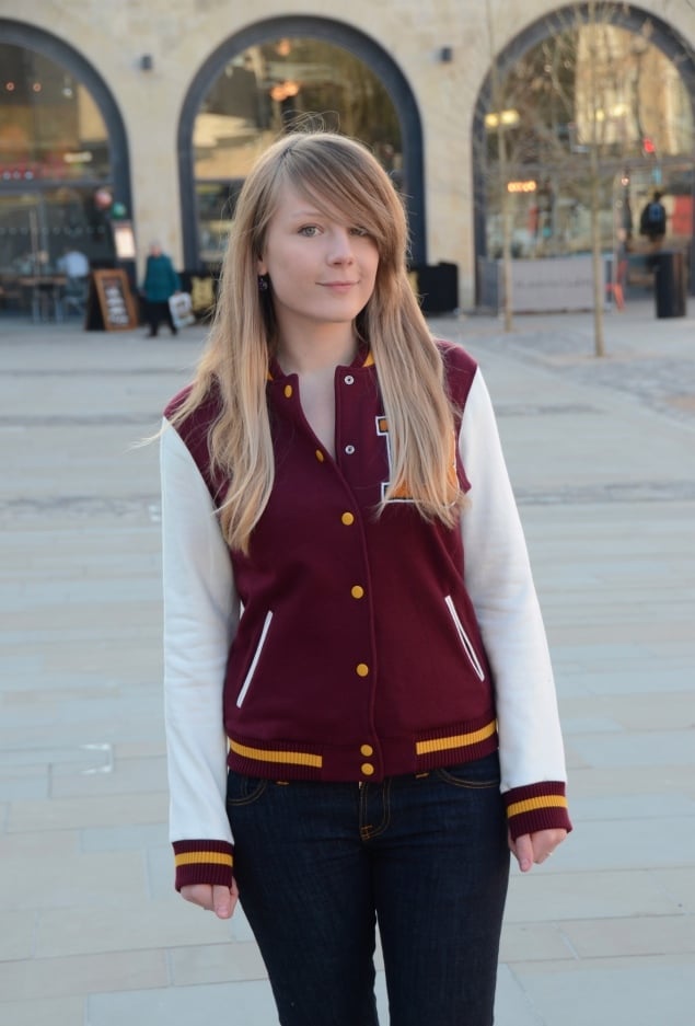 Burgundy and White Varsity Jacket with Dark Wash Jeans — Classy Varsity Jacket Outfits