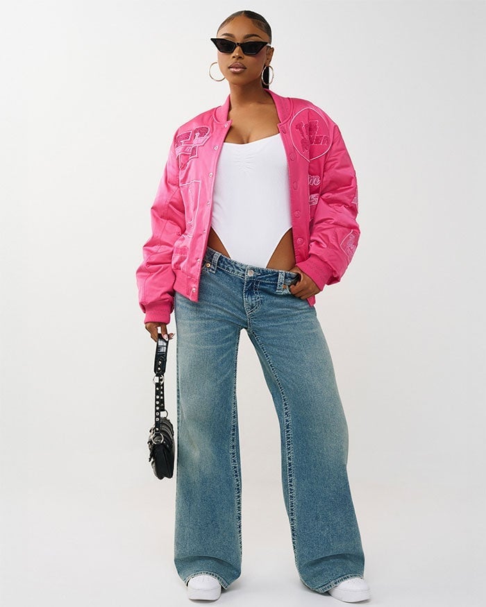 Pink Oversized Varsity Jacket with White Bodysuit and Jeans — Classy Varsity Jacket Outfits