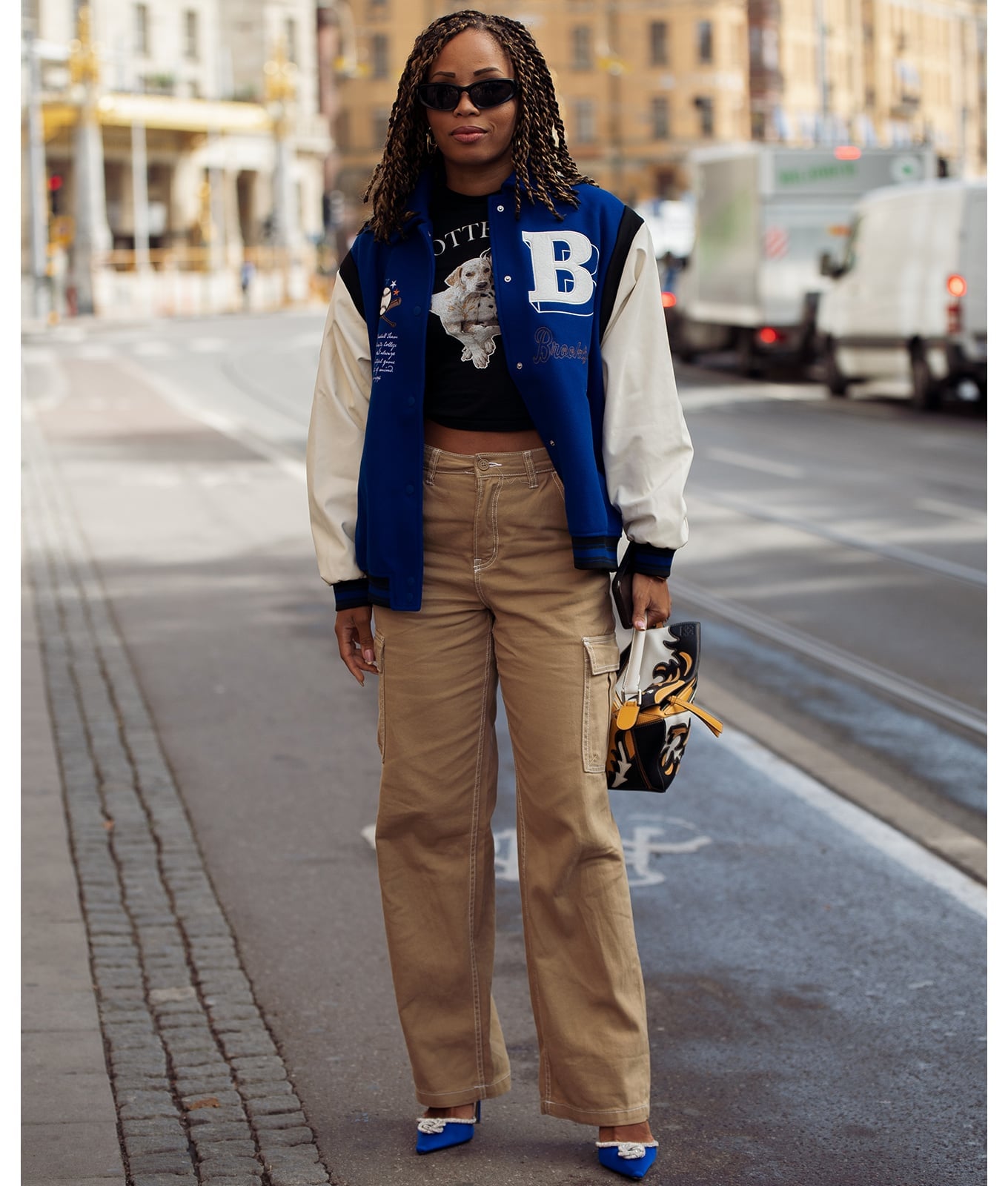 Blue and White Varsity Jacket with Graphic Tee and Cargo Pants — Classy Varsity Jacket Outfits