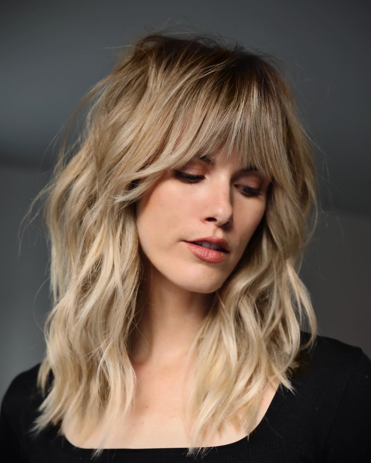 Collarbone Ash Blonde Shag With Full Bangs Collarbone Ash Blonde Shag With Full Bangs — Classy Wavy Hair Hairstyles