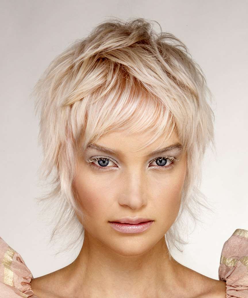 Platinum Blonde Shag With Wispy Bangs Platinum Blonde Shag With Wispy Bangs — Classy Wavy Haircuts