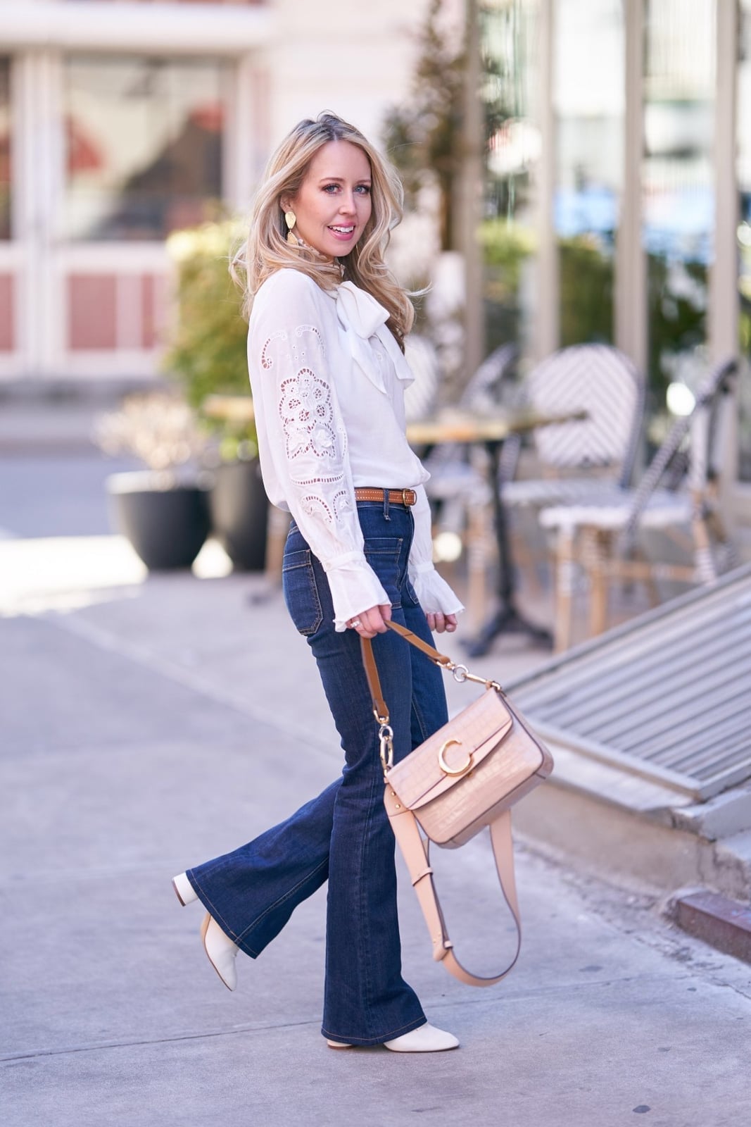 Detailed White Blouse With Flared Jeans Detailed White Blouse With Flared Jeans — Classy White Top Outfits