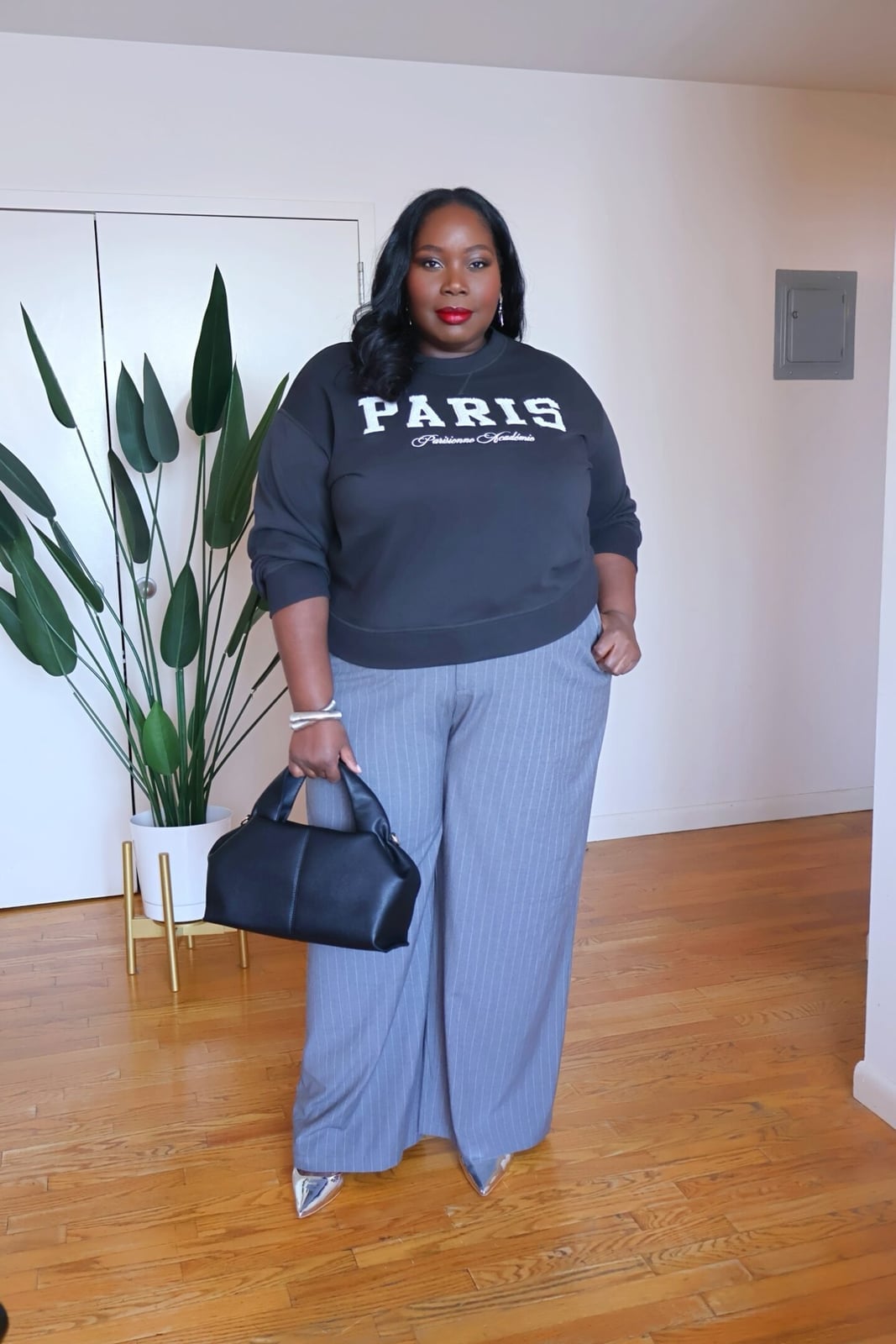 Gray Pinstripe Wide Leg Trousers with Black Sweatshirt, Close-Up Take — Classy Wide Leg Pants Outfits