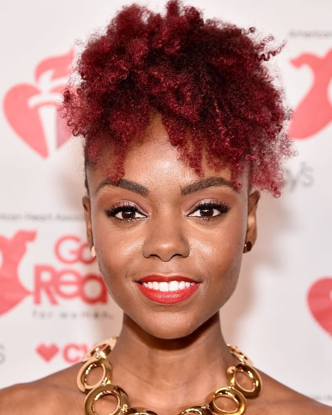 Short Vibrant Red Afro With Short Bangs Short Vibrant Red Afro With Short Bangs — Curly Hair Dye Styles
