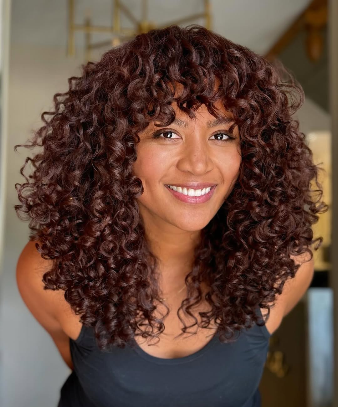 Shoulder Length Auburn Curly Hair With Curtain Bangs Shoulder Length Auburn Curly Hair With Curtain Bangs — Curly Hair Dye Styles