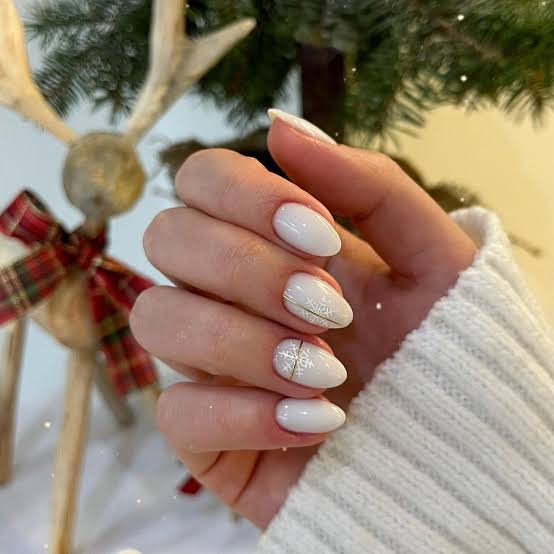 Medium Almond White Snowflake Art Nails Medium Almond White Snowflake Art Nails — Cute Classy Almond Nails