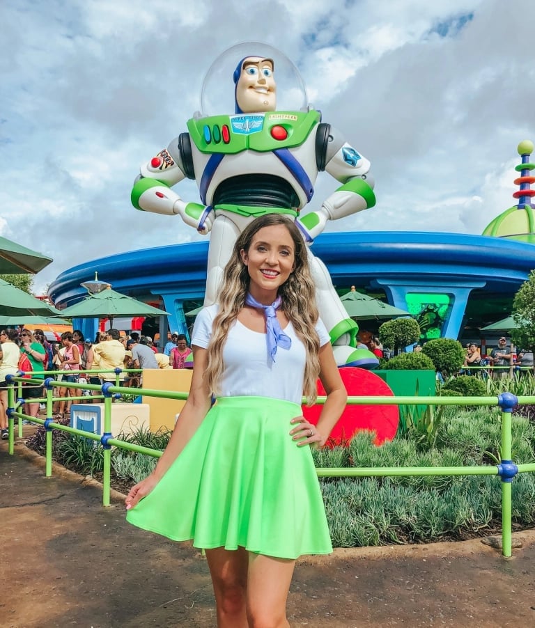 White T-Shirt and Bright Green Skater Skirt with Blue Scarf White T-Shirt and Bright Green Skater Skirt with Blue Scarf — Cute Disney Outfit Inspo