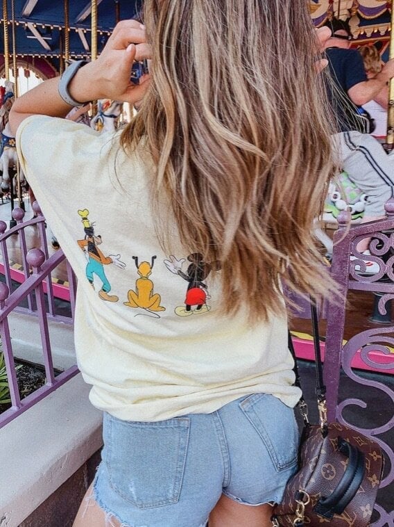 Yellow Disney Character T-Shirt with Denim Shorts and Crossbody Bag Yellow Disney Character T-Shirt with Denim Shorts and Crossbody Bag — Cute Disney Outfit Inspo