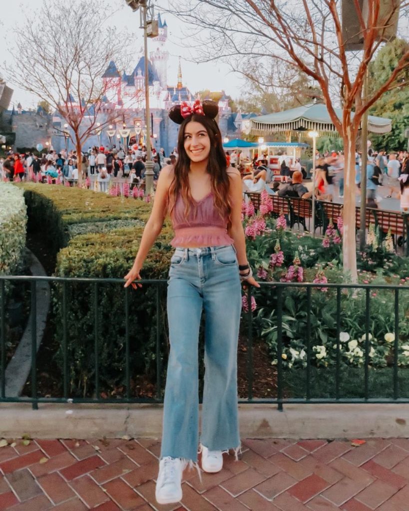 Purple Crop Top and Wide Leg Jeans for a Casual Look Purple Crop Top and Wide Leg Jeans for a Casual Look — Cute Disney Outfit Inspo