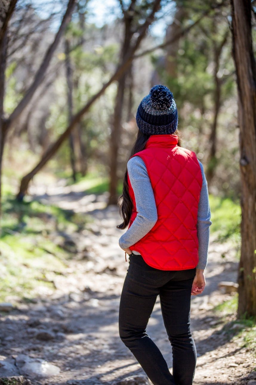 Red Quilted Vest Over Light Blue Sweater Red Quilted Vest Over Light Blue Sweater — Cute Hiking Outfit Inspo