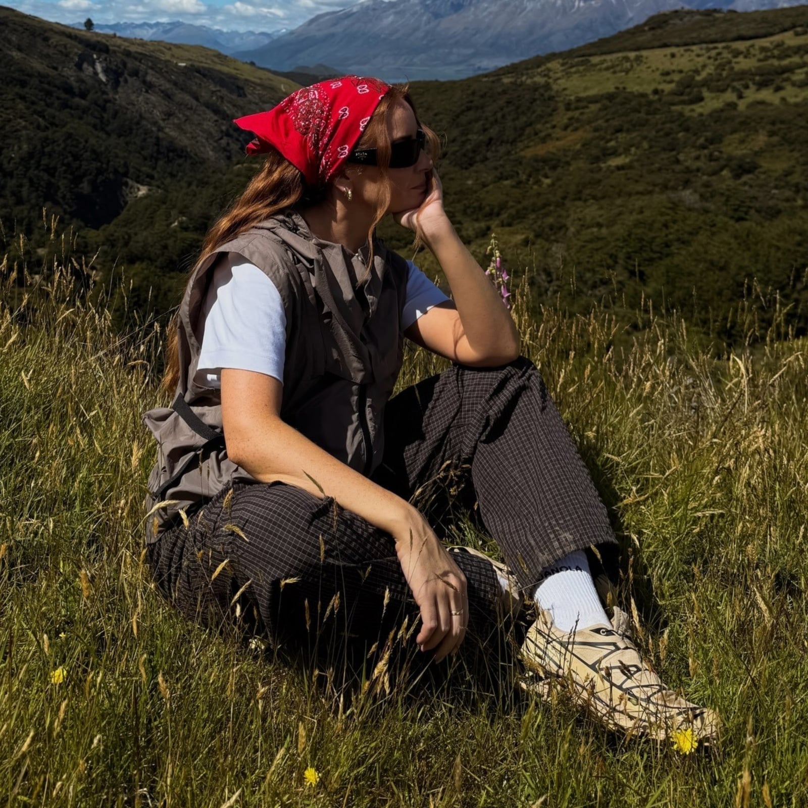 Gray Utility Vest Over Checkered Trousers Gray Utility Vest Over Checkered Trousers — Cute Hiking Outfit Inspo