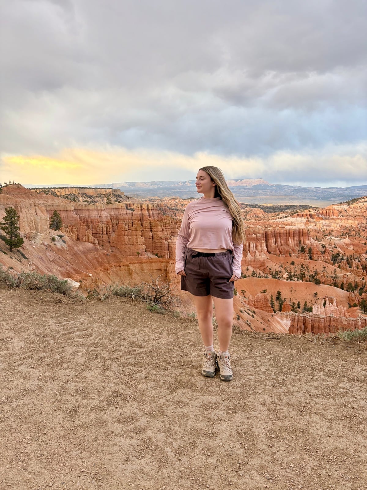 Pink Long-Sleeve Top With Gray Hiking Shorts Pink Long-Sleeve Top With Gray Hiking Shorts — Cute Hiking Outfit Inspo