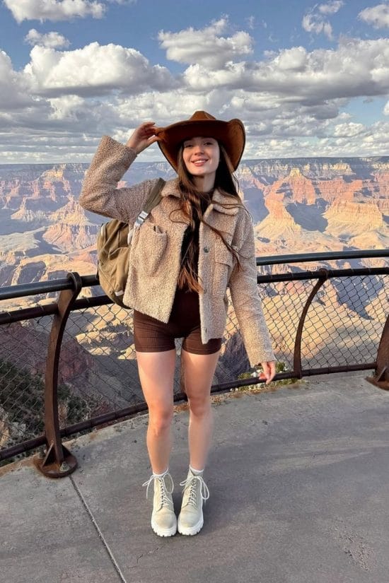 Fuzzy Beige Jacket Over Brown T-Shirt And Shorts Fuzzy Beige Jacket Over Brown T-Shirt And Shorts — Cute Hiking Outfit Inspo