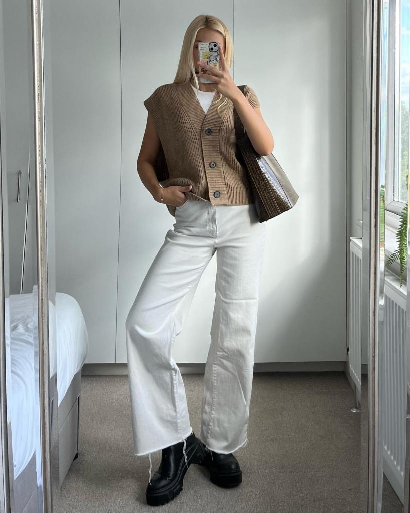 Ivory Wide Leg Jeans With Knit Vest Layer — Cute Jeans Outfit Inspo