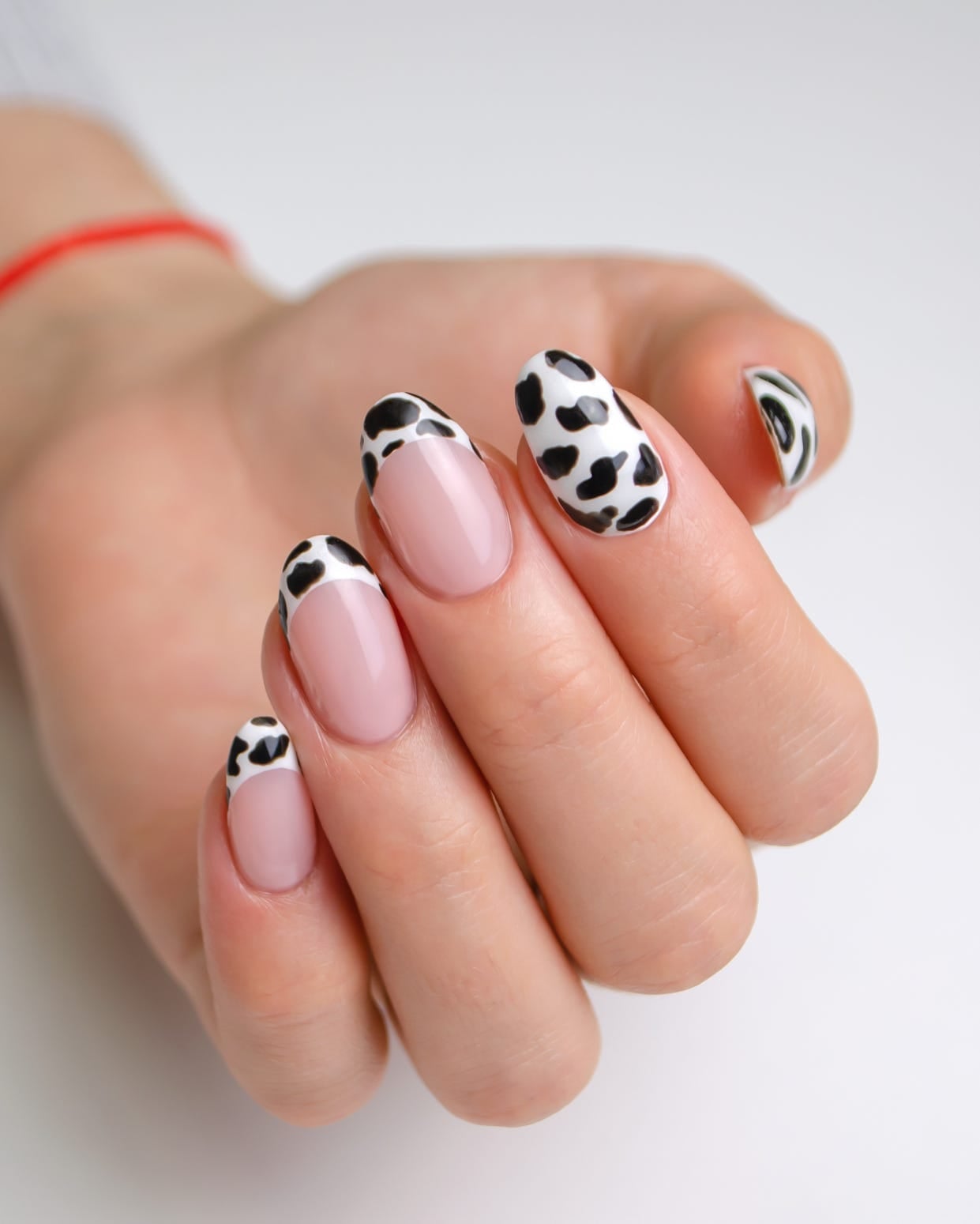 Sheer Pink Medium Oval With Cow Print Tips — Cute Medium Nails