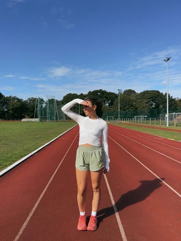 White Ruched Top with Pale Green Athletic Shorts White Ruched Top with Pale Green Athletic Shorts — Cute Running Outfits