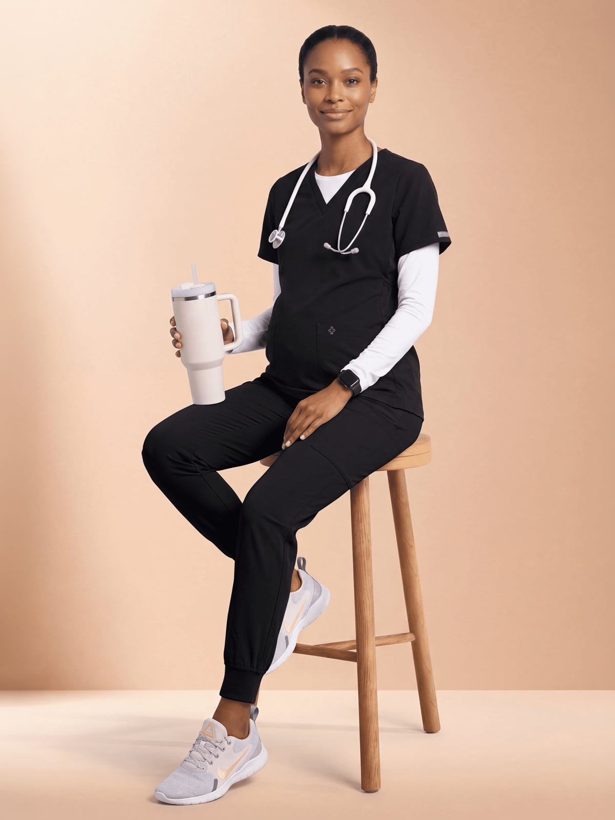 Layered Black Scrub Outfit with Vibrant Sneakers Layered Black Scrub Outfit with Vibrant Sneakers — Cute Scrubs Outfits
