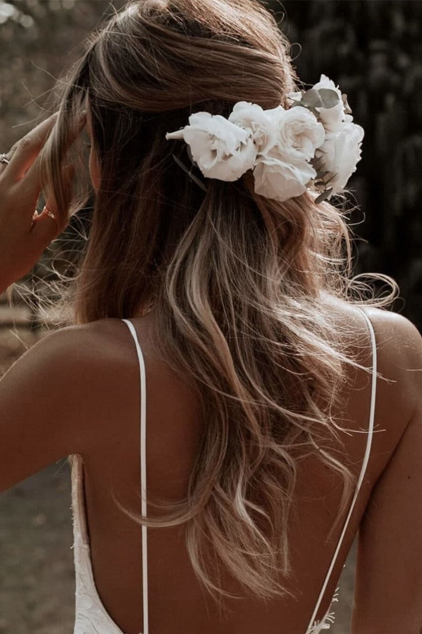 Blonde Half Up Half Down With Floral Accessory — Easy Wedding Hairstyles for Long Hair