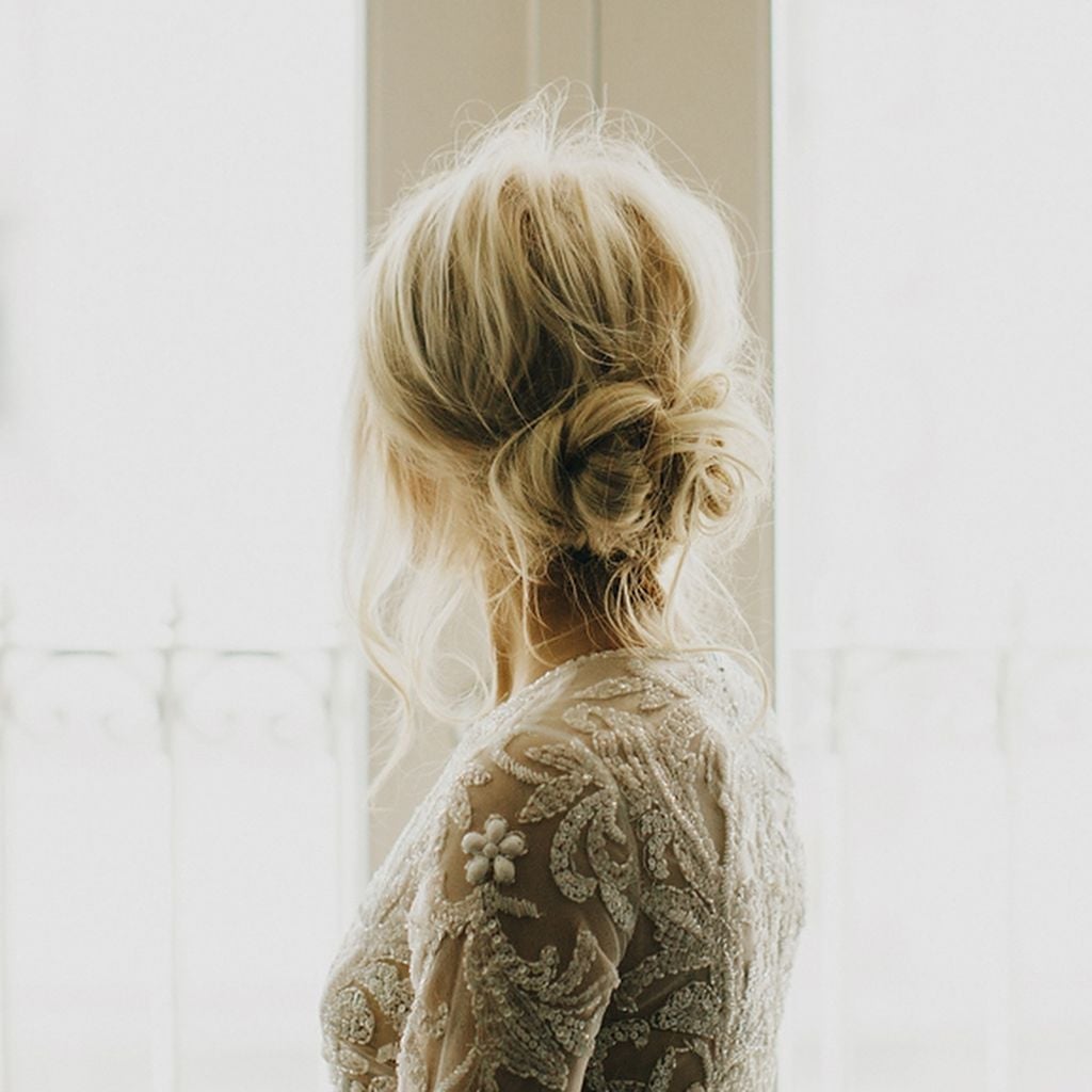 Blonde Textured Bun With Loose Tendrils — Easy Wedding Hairstyles for Long Hair