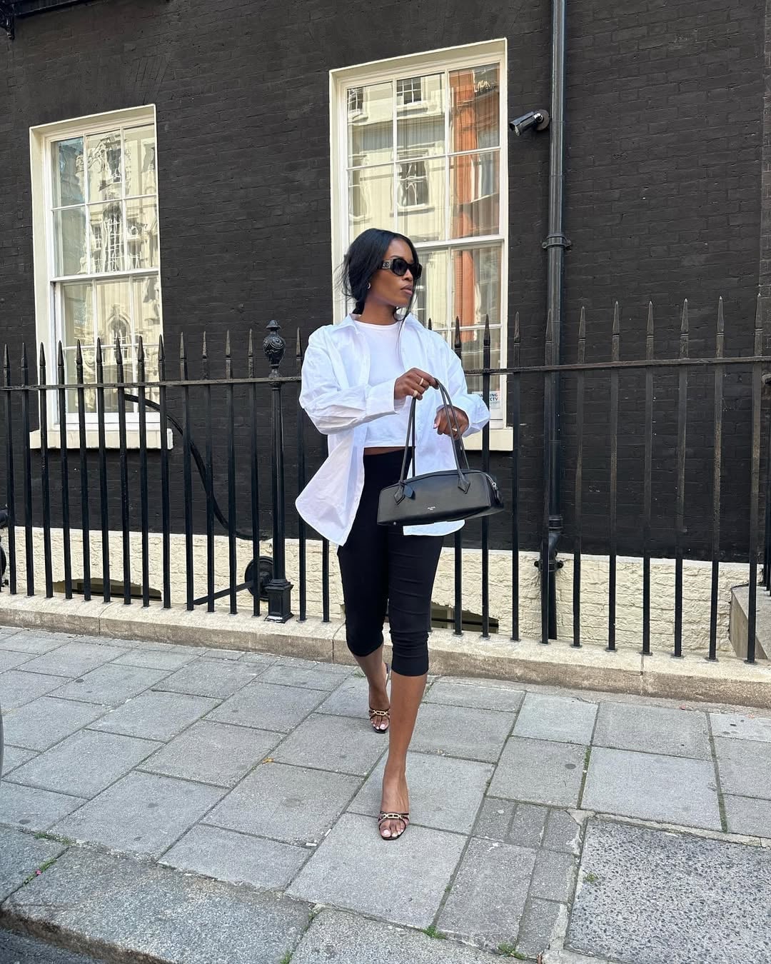 Black Capris with Oversized White Shirt and Studded Sandals Black Capris with Oversized White Shirt and Studded Sandals — Elegant Black Capri Pants Outfit