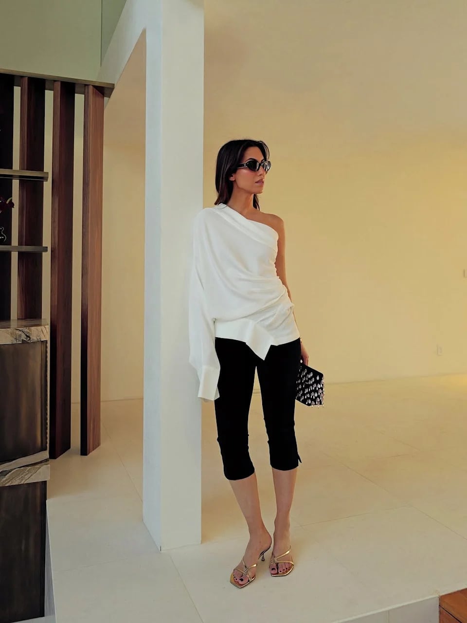Black Capris with One-Shoulder Top and Gold Sandals Black Capris with One-Shoulder Top and Gold Sandals — Elegant Black Capri Pants Outfit