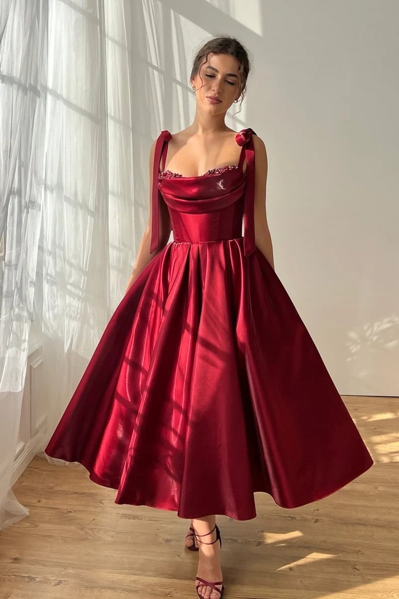 Burgundy Satin A-line Dress with Bow Straps and Strappy, Close-Up Take Burgundy Satin A-line Dress with Bow Straps and Strappy, Close-Up Take — Elegant Burgundy Dress Outfit