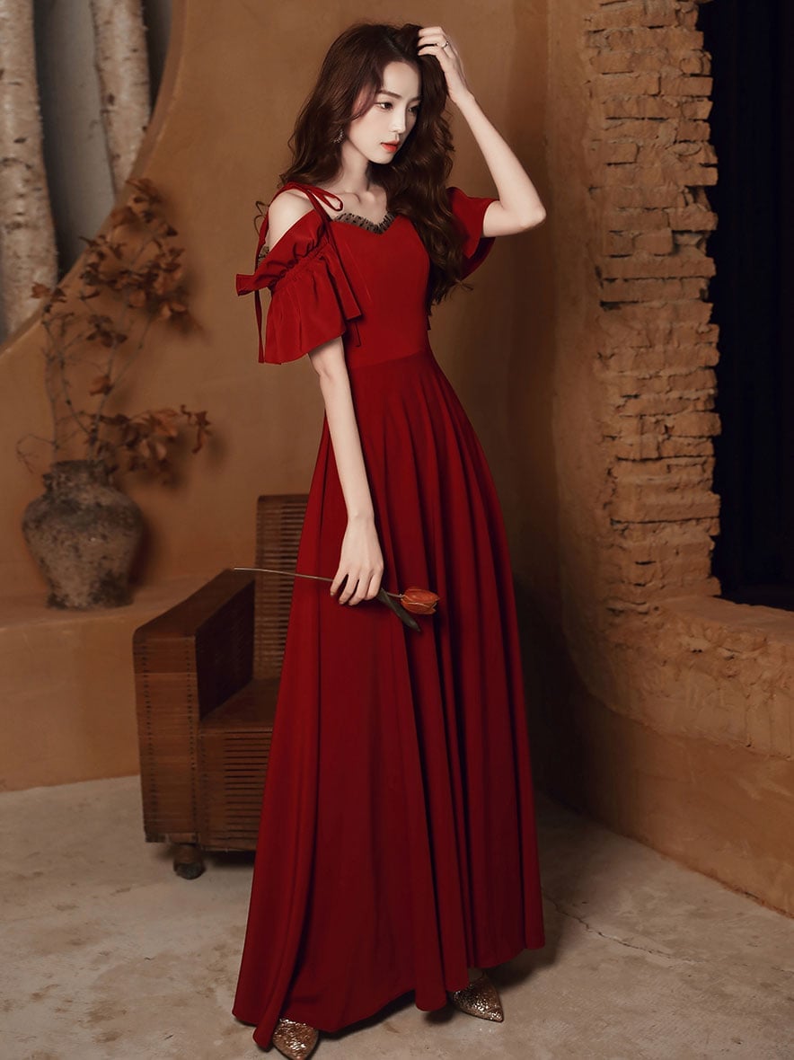 Burgundy Satin A-line Dress with Cold Shoulder Bows, Close-Up Take Burgundy Satin A-line Dress with Cold Shoulder Bows, Close-Up Take — Elegant Burgundy Dress Outfit