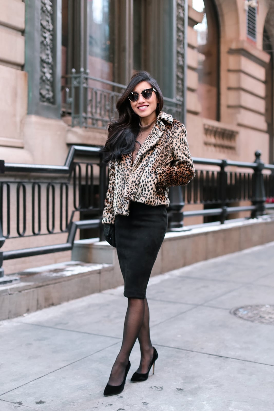 Leopard Print Faux Fur Jacket Over a Black Top and Pencil Skirt Leopard Print Faux Fur Jacket Over a Black Top and Pencil Skirt — Elegant Leopard Print Outfits