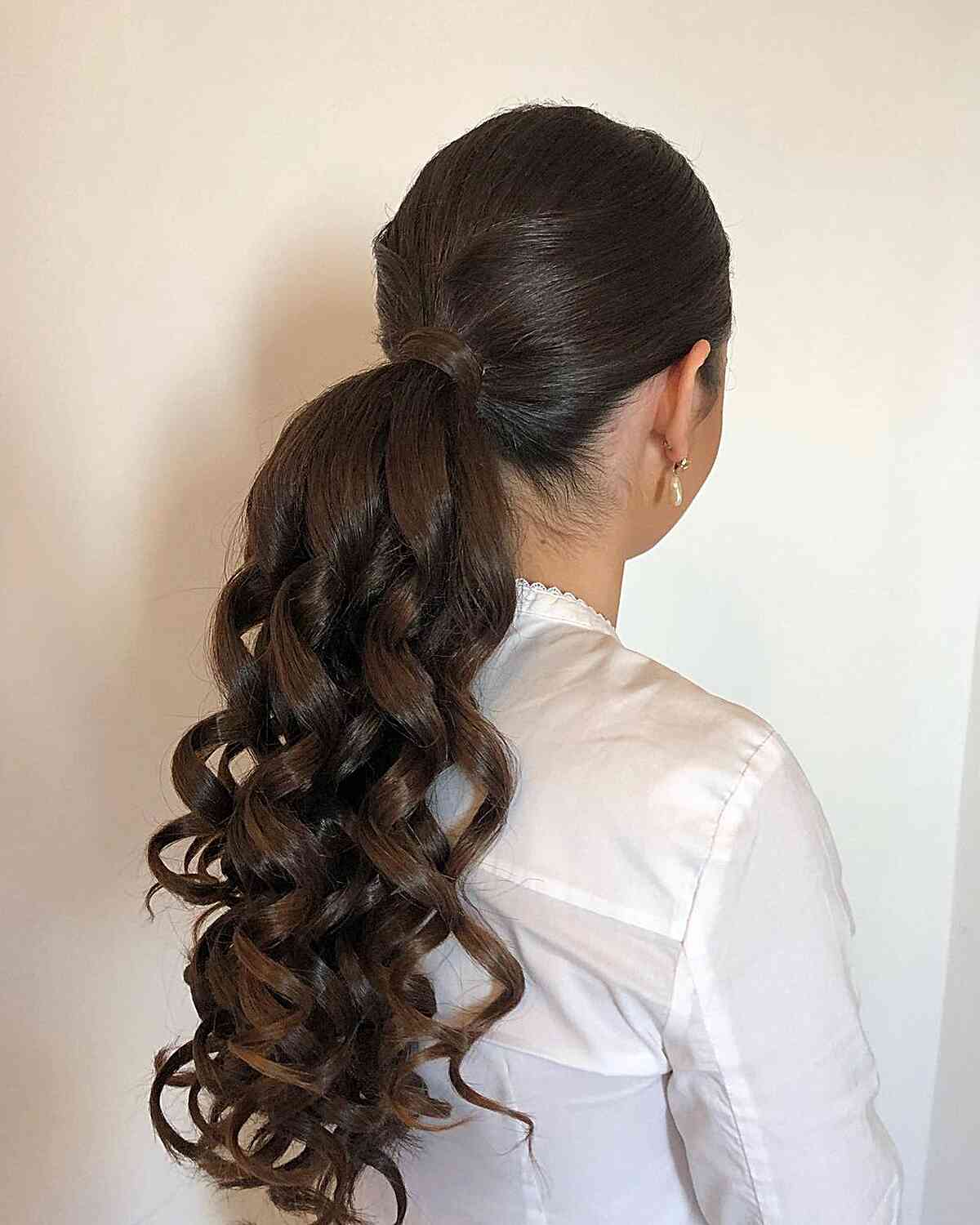 Dark Brown Curly Low Ponytail With Caramel Highlights — Elegant Low Ponytail Hairstyles