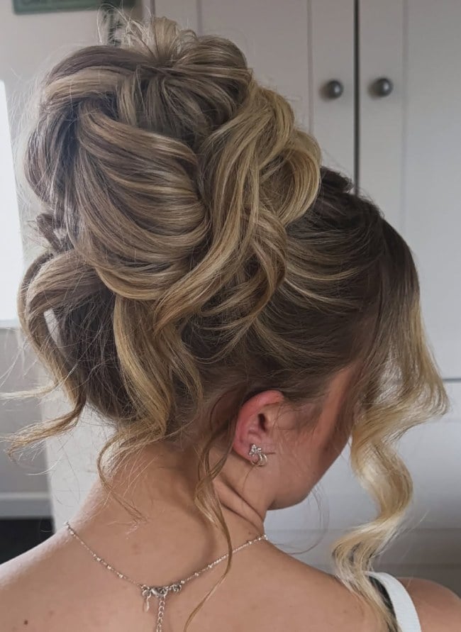 Voluminous Blonde High Bun With Curls — Elegant Updo Inspo