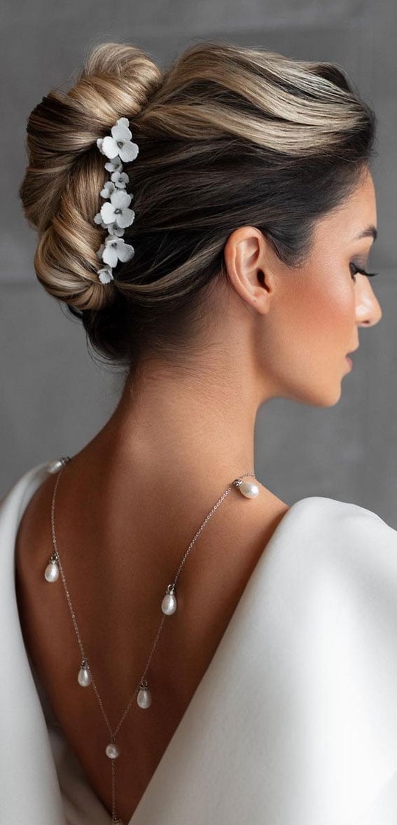 Elegant Blonde Updo With Floral Accessory — Elegant Updo Inspo