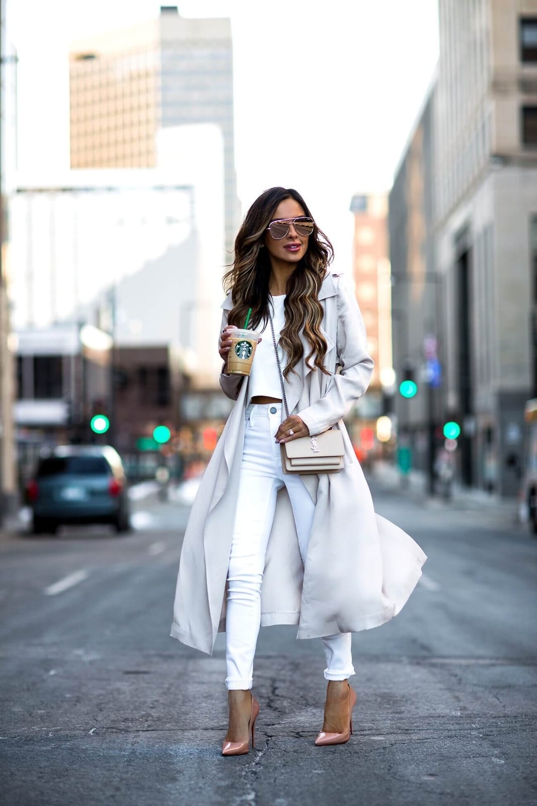 White Trench Coat Over Crop Top and Fitted Jeans White Trench Coat Over Crop Top and Fitted Jeans — Elegant White Jacket Outfit