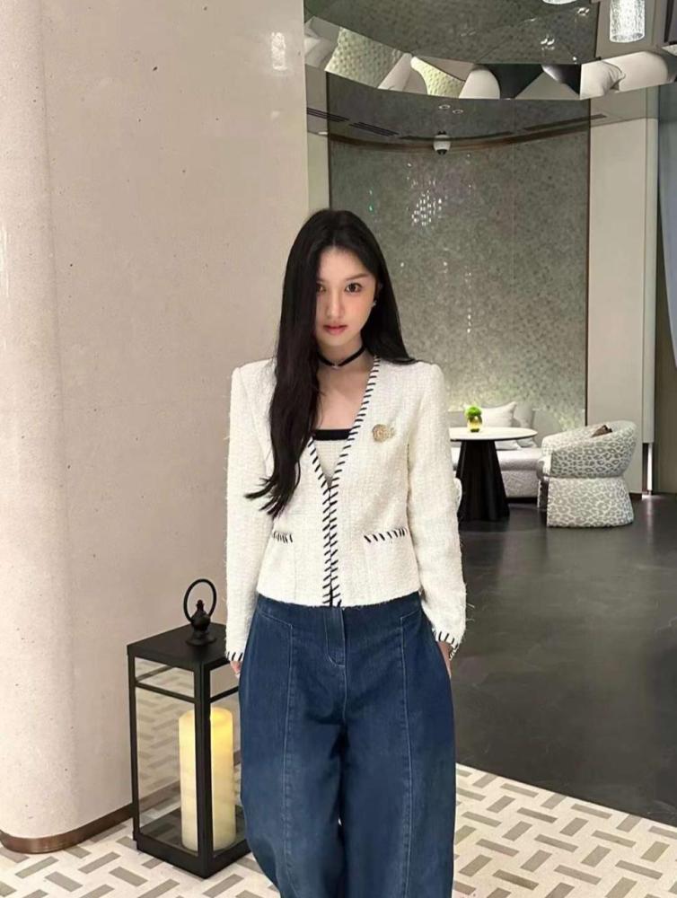 White Tweed Jacket with Black Trim and Brooch White Tweed Jacket with Black Trim and Brooch — Elegant White Jacket Outfit
