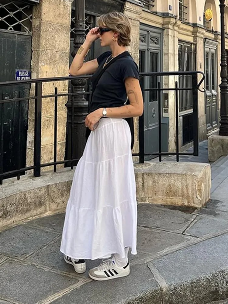 White Tiered Flowy Maxi Skirt With Black T-Shirt — Elegant White Maxi Skirt Outfit