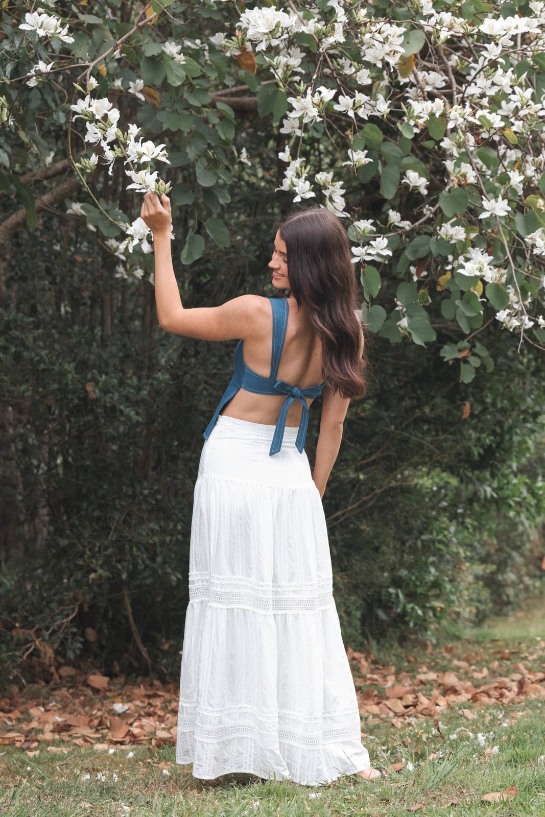 White Eyelet Tiered Maxi Skirt With Denim Halter Top — Elegant White Maxi Skirt Outfit