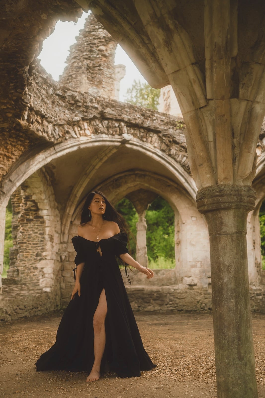 Black Off-The-Shoulder Dress With Flowing Silhouette, Close-Up Take Black Off-The-Shoulder Dress With Flowing Silhouette, Close-Up Take — Ethereal Dress Ideas