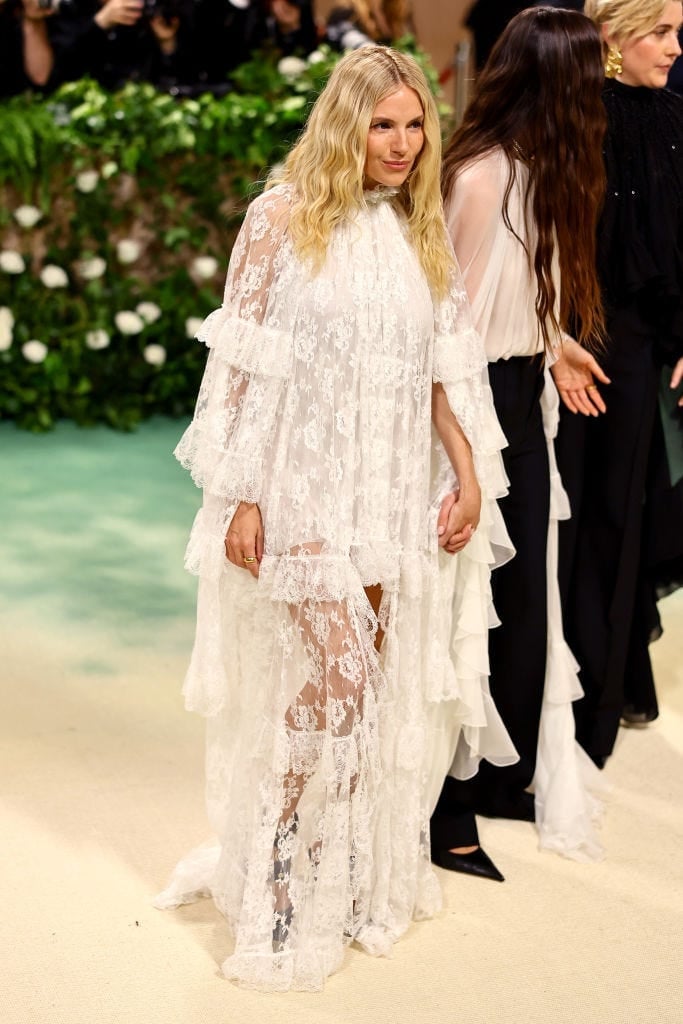 White Tiered Voluminous Lace Dress With Sheer Elements White Tiered Voluminous Lace Dress With Sheer Elements — Ethereal Dress Ideas
