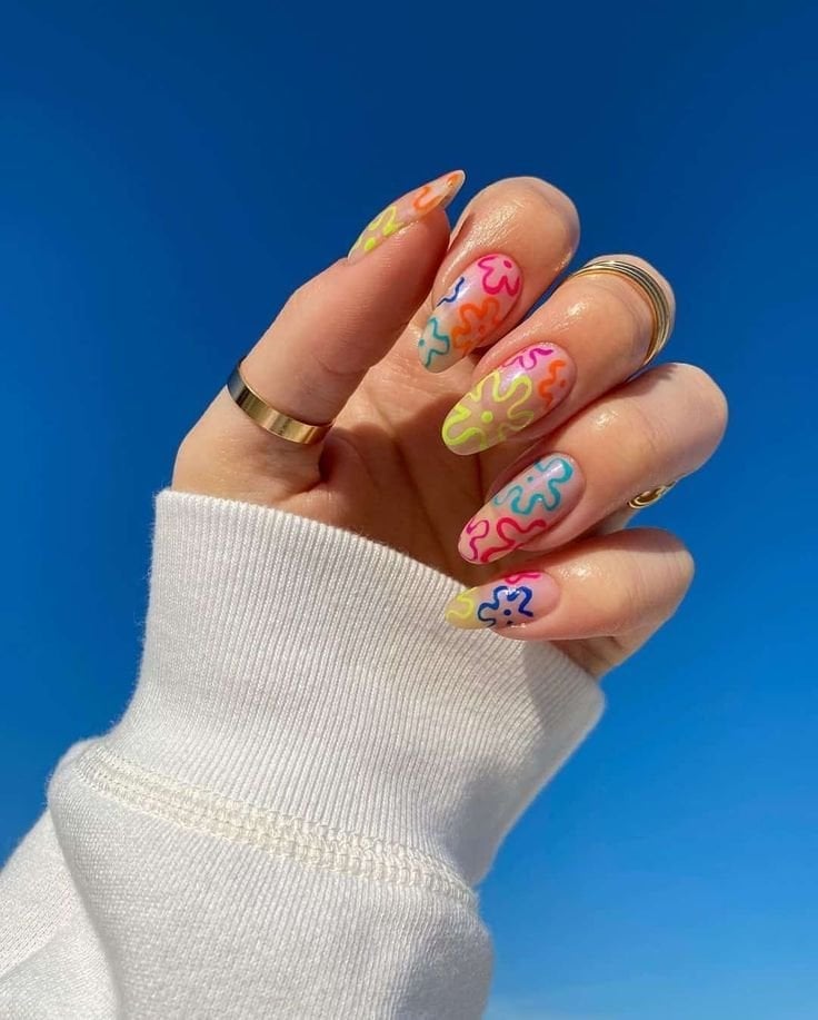 Medium Oval Nails with Neon Floral Patterns Medium Oval Nails with Neon Floral Patterns — Gel Nail Art Ideas