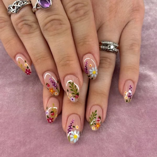 Medium Almond Nails with Miniature Floral Designs and Ladybugs Medium Almond Nails with Miniature Floral Designs and Ladybugs — Gel Nail Art Ideas