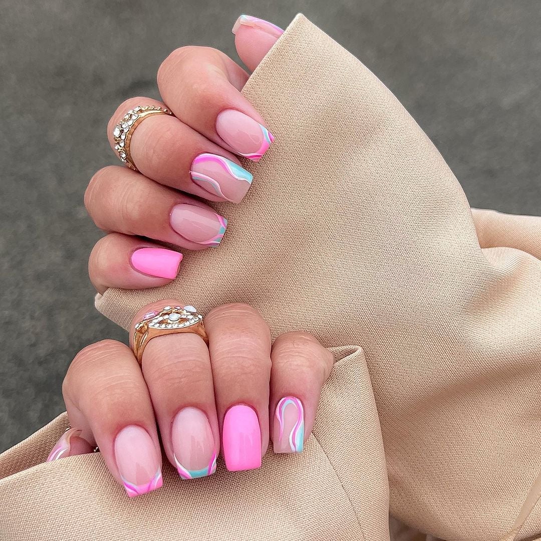 Medium Almond Nails with Colorful 3D Flower Embellishments Medium Almond Nails with Colorful 3D Flower Embellishments — Gel Nail Art Ideas