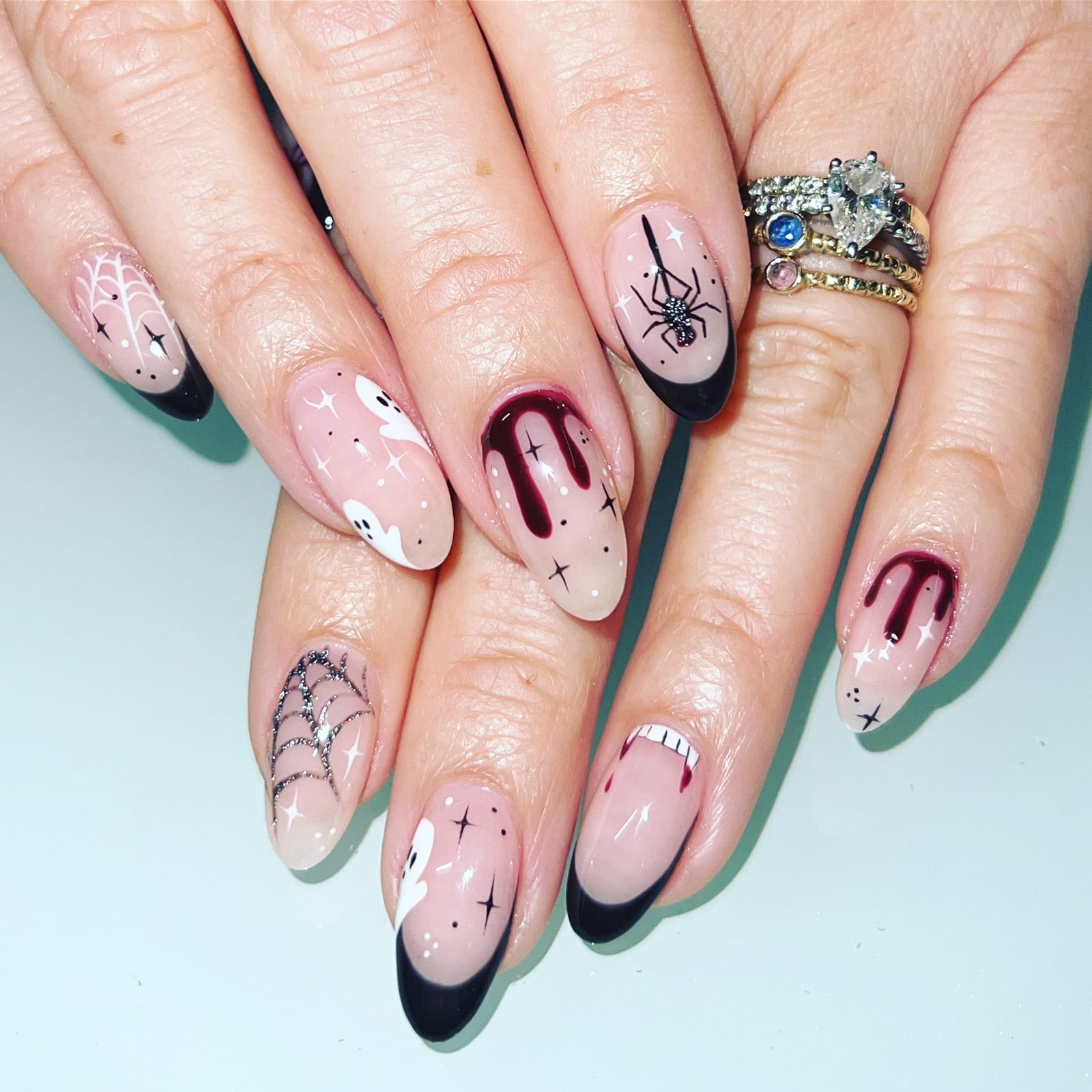 Medium Almond Halloween Nails with Ghosts, Webs, and Blood Drops Medium Almond Halloween Nails with Ghosts, Webs, and Blood Drops — Gel Nail Art Ideas