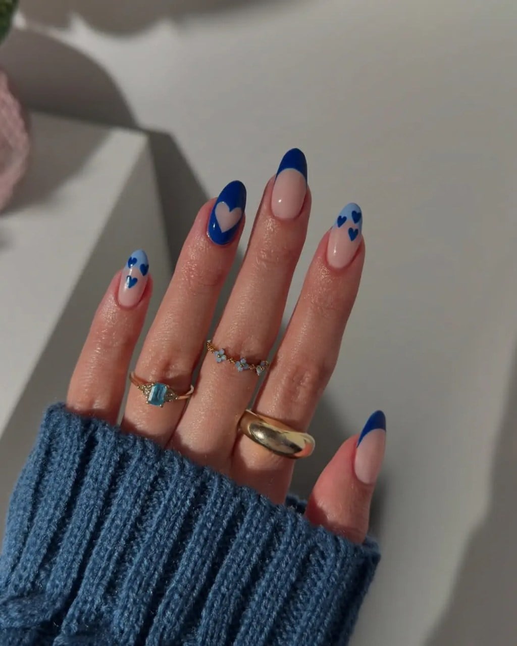 Sheer Nude Medium Almond with Blue French Tips and Hearts Sheer Nude Medium Almond with Blue French Tips and Hearts — Gel Nail Art Ideas