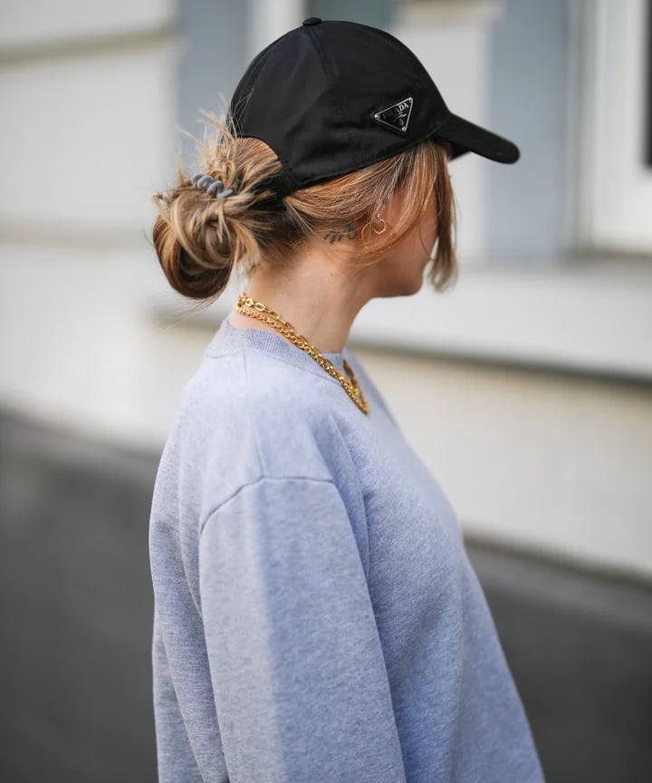 Ash Blonde Messy Bun Under Backward Cap — Hair Ideas with Hat