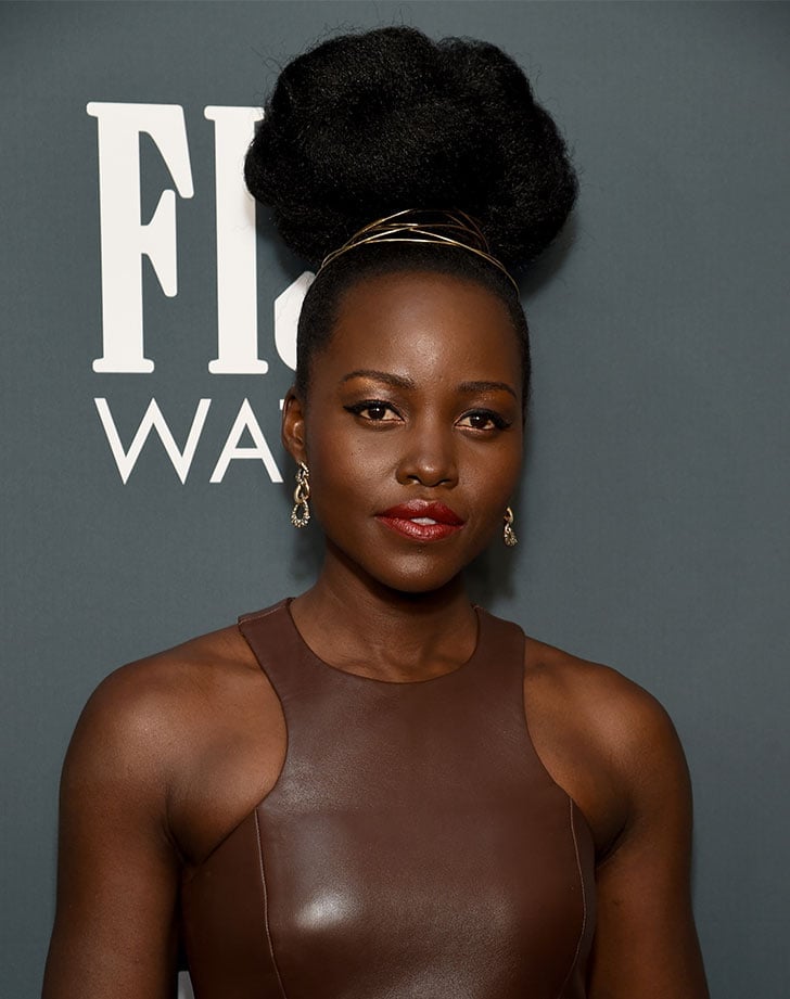 High Volume Coily Black Bun High Volume Coily Black Bun — Natural Bun Ideas