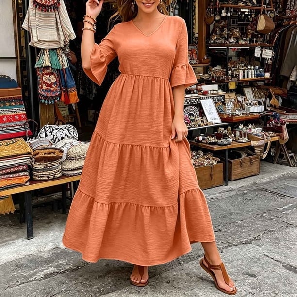 Flowing Orange Tiered Maxi Dress With Brown Accessories Flowing Orange Tiered Maxi Dress With Brown Accessories — Orange Dress Ideas