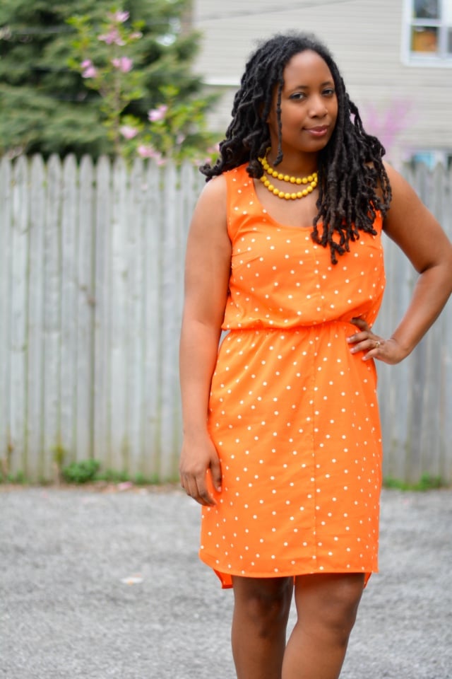 Sleeveless Orange Polka Dot Dress With Beaded Necklace Sleeveless Orange Polka Dot Dress With Beaded Necklace — Orange Dress Ideas