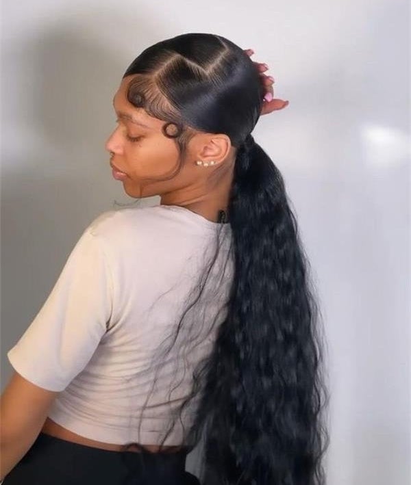 Mid-Back Slicked Ponytail With Waves Mid-Back Slicked Ponytail With Waves — Quick Weave Ponytail Ideas