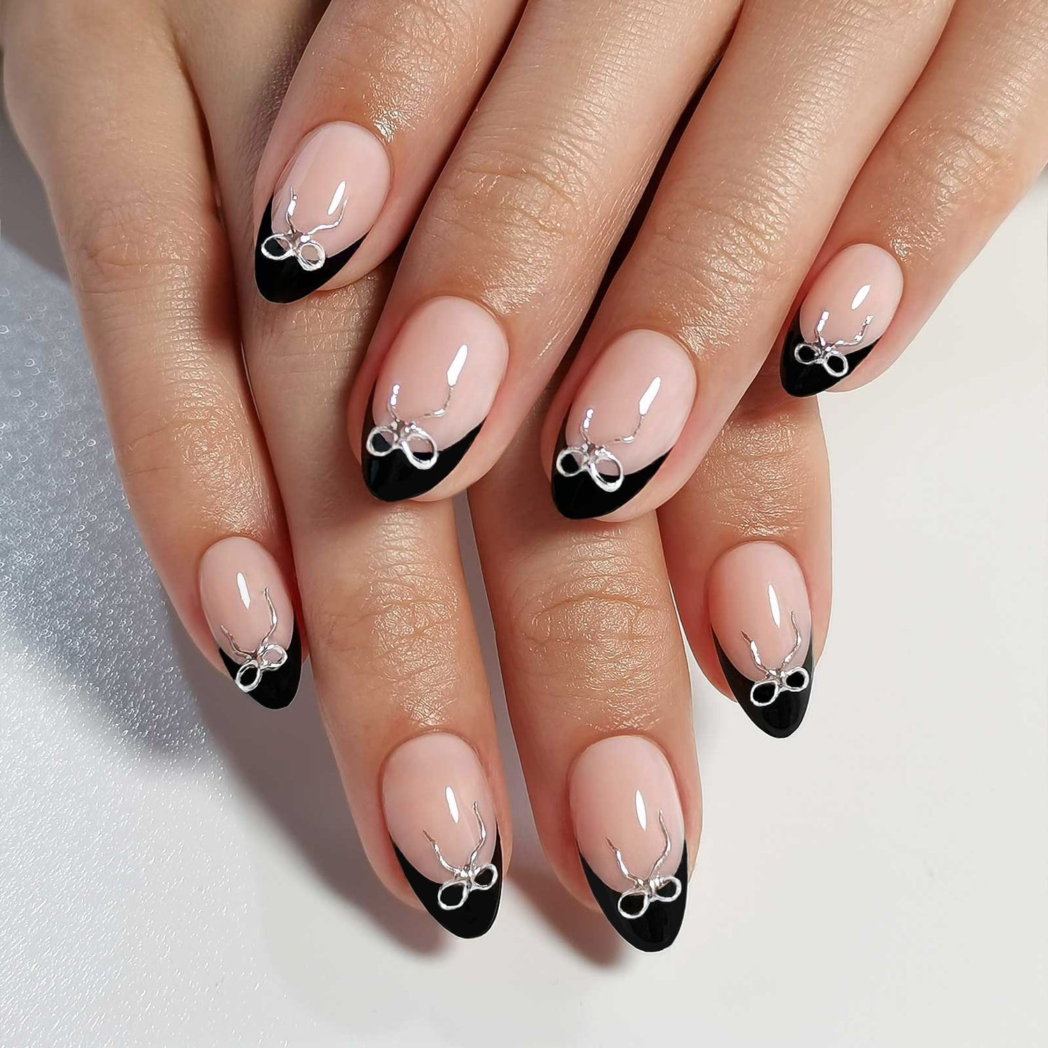 Medium Oval Nude French with 3D Silver Bows Medium Oval Nude French with 3D Silver Bows — Simple 3D Nails